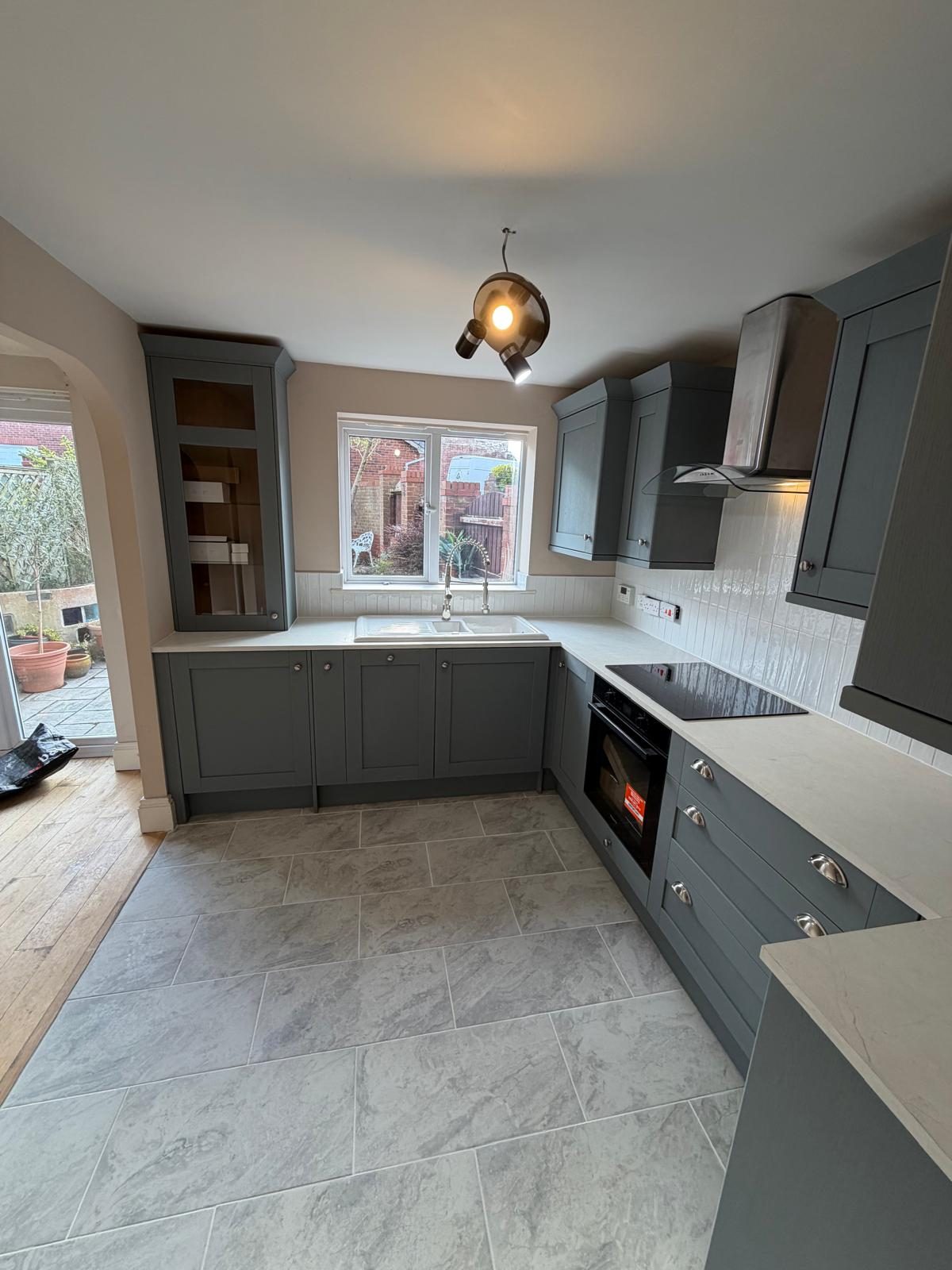 Finished bespoke grey shaker kitchen with new flooring